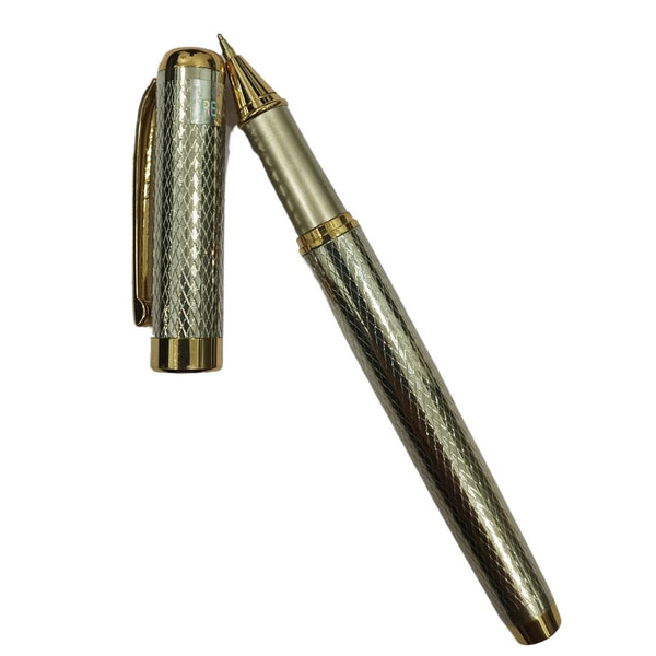 Silver and gold engraved pen with openable design for elegant, professional writing.