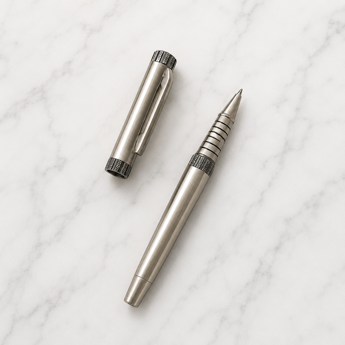 Glossy gunmetal roller ball pen with gunmetal cap, openable mechanism and blue ink
