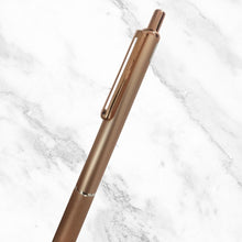 Rose Gold and Brown Metal Pen – Elegant Design